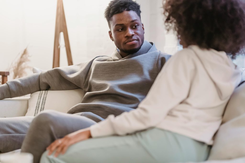 Couple talking together — deciding between couples therapy and individual therapy as a first step